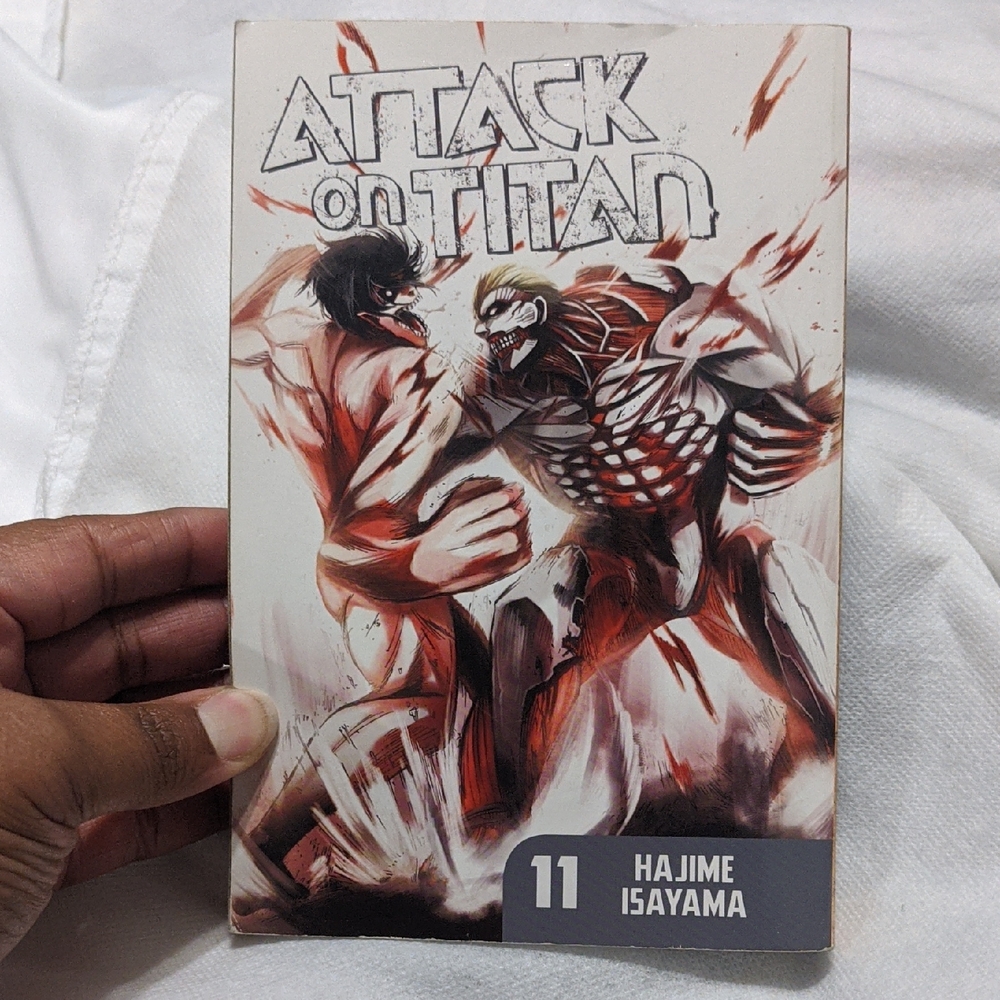 Attack on Titan Vol. 11 Manga Paperback - Red & White Cover